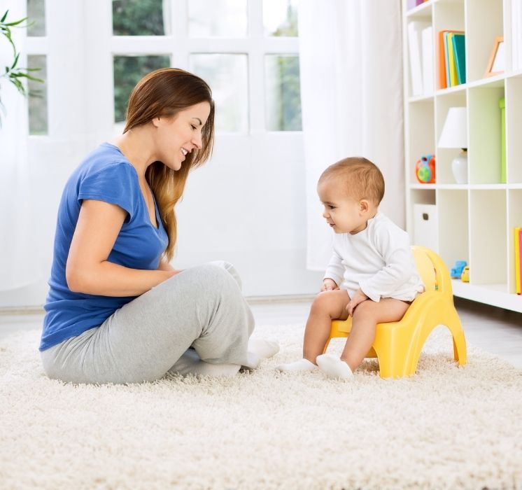Parents échangeant sur leur rôle et leur héritage culturel lors d'une session de "Grandir avec son enfant" chez Pluri-elles, Winnipeg.